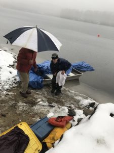 John Cooley holding rescued Loon